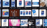 a display of qtips cotton swabs and other products