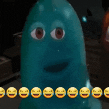 a blue balloon with a face and a row of smiley faces around it