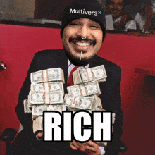 a man in a suit and tie is holding stacks of money and the word rich is on the bottom