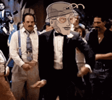 a man in a tuxedo with a hat and glasses is dancing in a crowd