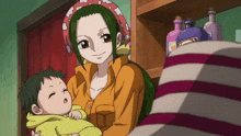 a woman is holding a baby in her arms in front of a shelf with bottles on it