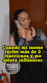 a woman talking on a cell phone with the words cuando mi meme recibe mas de 3 reacciones