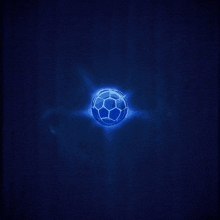 a blue soccer ball is surrounded by a glowing circle