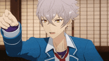 a boy with gray hair and yellow eyes is pointing at something