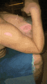 a blurry picture of a person 's arm with a reflection
