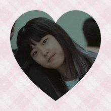 a picture of a girl in a heart shape