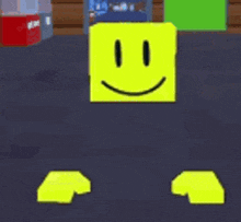 a yellow block with a smiley face on it is standing on a dark floor in a room .