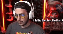 a man wearing glasses and headphones says if eddie ever lets me win