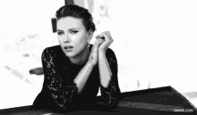 a black and white photo of a woman with the website swide.com in the corner