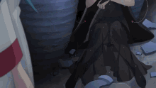 a woman in a black dress is sitting on the ground holding a sword