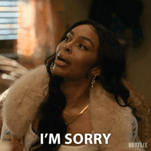 a woman says i 'm sorry in a netflix advertisement