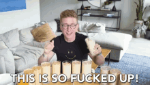 a man holding a milkshake with the words " this is so fucked up " next to him