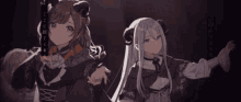 a girl with horns is standing next to another girl with long hair