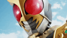 a close up of a masked superhero 's face with a blue sky in the background