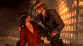 a man in a red shirt is holding another man 's arm