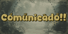 a sign that says comunicado on it with a wreath around it