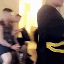 a blurry photo of a man in a black robe