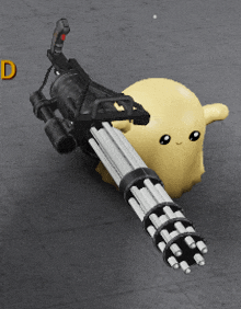 a toy gun is sitting next to a toy sheep