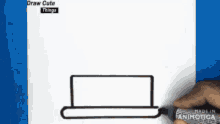 a person is drawing a hat with a marker on a piece of paper