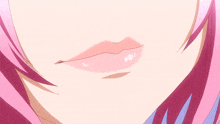 a close up of a girl 's mouth with her tongue out
