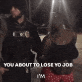 a woman in handcuffs is talking to a police officer and says " you about to lose yo job i 'm "