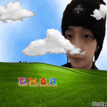 a picture of a person with the name gna3 written on the grass