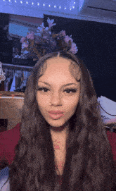 a girl with a sticker on her face that says ' roc '