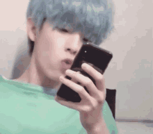 Jae Day6jae GIF - Jae Day6jae Jae Reading Phone GIFs