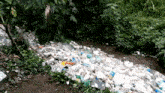 a pile of garbage is sitting on the side of a road