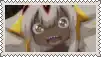 a close up of a cartoon character with white hair and yellow horns making a funny face .