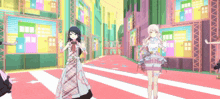 a couple of anime girls are standing next to each other on a red carpet in a video game .