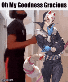 a man in a mask is standing next to a woman in a cat mask with the words oh my goodness gracious on the bottom