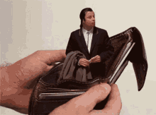 Wallet Empty GIF - Wallet Empty John Travolta GIFs