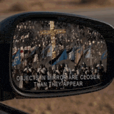 objects in mirror are closer than they appear on a car rear view mirror