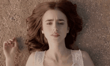 Lilly Collins GIF - Lilly Collins On The Ground GIFs