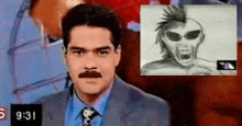 a man in a suit and tie is standing in front of a screen with a picture of an alien behind him .