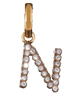 a gold letter n pendant with diamonds on it