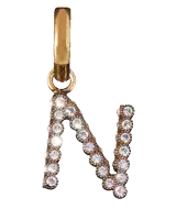 a gold letter n pendant with diamonds on it