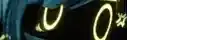 a blurry picture of a person 's face with a yellow light coming out of it