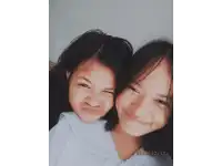 two girls are posing for a picture with the date 02.06.17