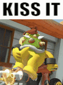 a picture of a video game character with the words kiss it on the bottom