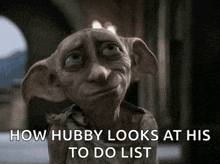 a dobby from harry potter is looking at his to do list