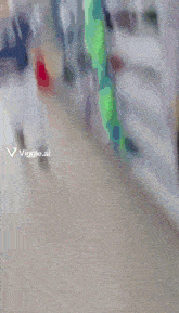 a cartoon of a man in a green superhero costume with a viggle.ai watermark in the corner