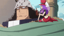 a woman with purple hair is kneeling next to a man with a hat on