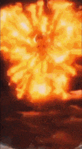 a close up of a fire explosion in a dark room