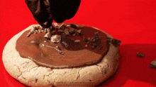 a kitkat cookie with chocolate icing on it
