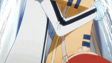a close up of a person 's arm with a blue stripe