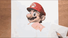 a drawing of mario with a red hat and a letter m on it