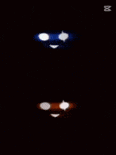 a blue and orange face with glowing teeth and a caption that says capcut