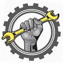 a fist is holding a wrench in a gear .